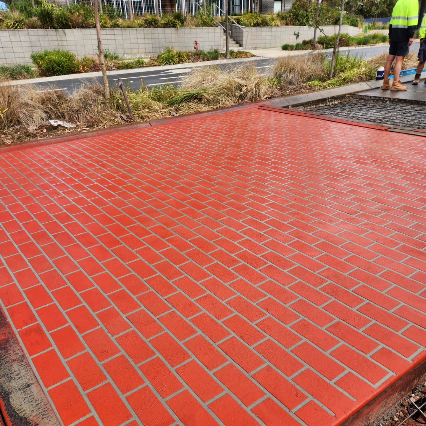 Vibrant red brick pattern pedestrian crossing